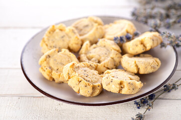 sugar and gluten free keto cookies on white wooden background decorated with lavender
