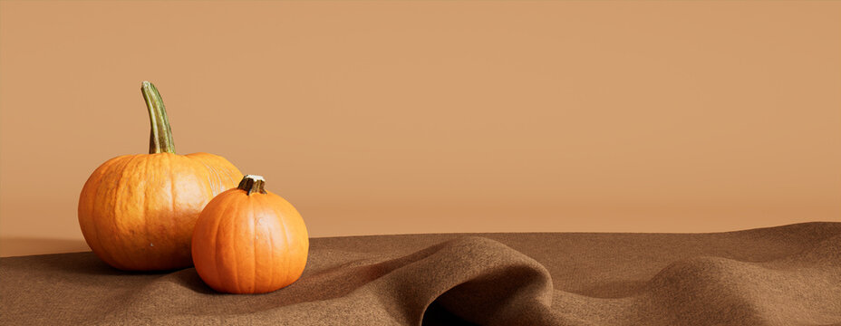 Seasonal background Background with copy-space. Pumpkins with Warm Brown color Blanket. Autumn Concept.