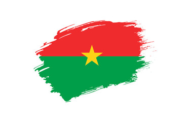 Creative hand drawn grunge brushed flag of Burkina Faso with solid background