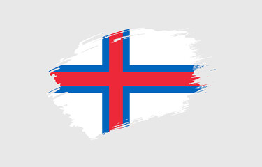 Creative hand drawn grunge brushed flag of Faroe Islands with solid background