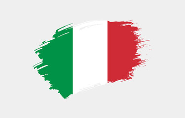 Creative hand drawn grunge brushed flag of Italy with solid background
