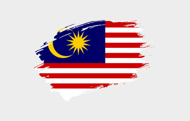 Creative hand drawn grunge brushed flag of Malaysia with solid background