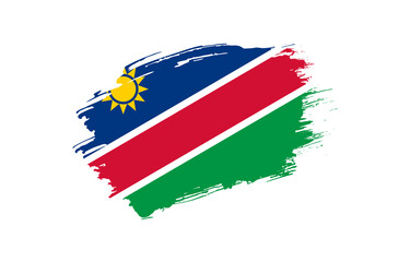 Creative hand drawn grunge brushed flag of Namibia with solid background
