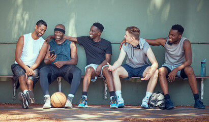 Basketball, sport and friends with a team of men sitting on a bench after training, practice or a...
