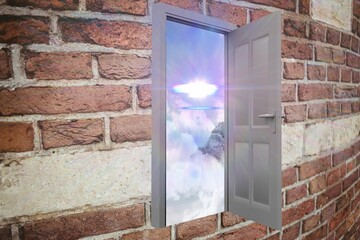 Obraz premium Open door on brick wall with sunbeams
