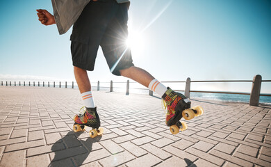 Person roller skating, sport and fitness on a sidewalk, sea or ocean shore. Sun flare, exercise and...