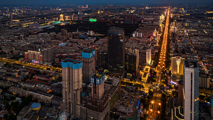 Fototapeta premium People's Street in Changchun, China under the sunset