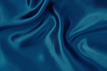 Fototapeta premium Dark blue fabric cloth texture for background and design art work, beautiful crumpled pattern of silk or linen.