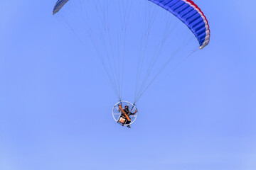 Man flying with paraglider