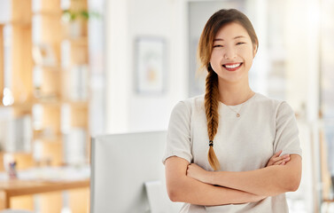 Vision, business and goals by proud asian corporate employee working on design and marketing in an office. Portrait of a happy, smiling entrepreneur excited about startup success and career mission