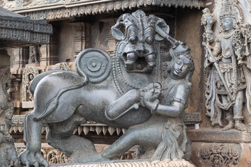 Sculpture of Hoysala Emblem outside of the  Chennakeshawa Temple, Belur, Hassan, Karnataka, India.