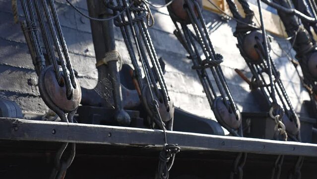 Close up shot of war brigs black timber frame and mast rigging