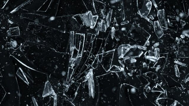 Super Slow Motion Shot of Breaking Real Glass at 1000 fps. Isolated on Black Background.