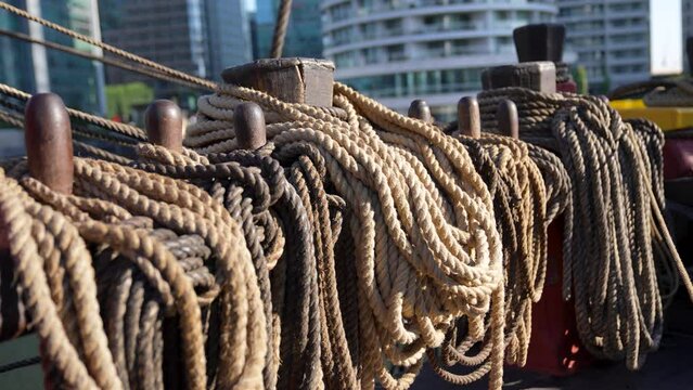 old wooden naval warship rigging rope