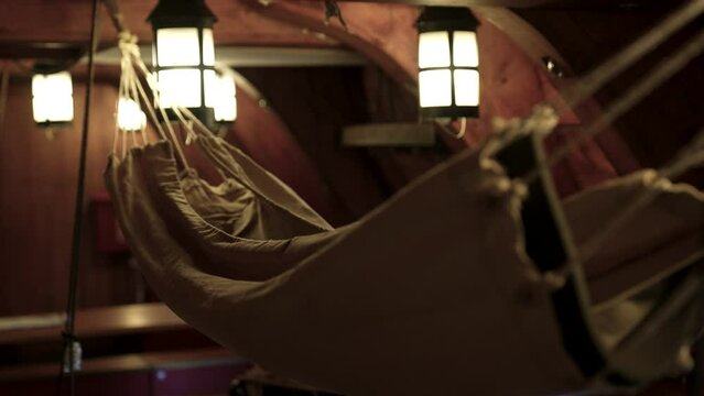 Close up of old warships hammock below decks