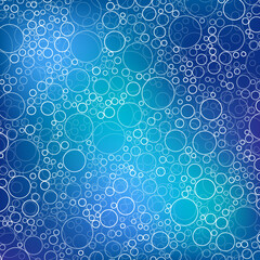 Blue abstract background with bubbles texture.