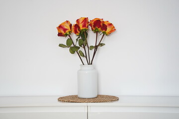 Multicolored macaroons on a round coffee table