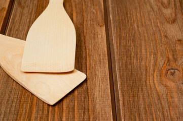 Wooden spatulas for comfortable turning food while cooking.
