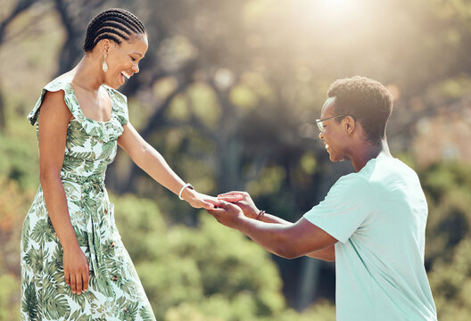 Love, Engagement And Black Man Propose To Girlfriend On Romantic Date Outdoors, Happy And Excited. African Woman Surprise Sweet Gesture, Enjoying Special Relationship Moment On Outdoor Date Together