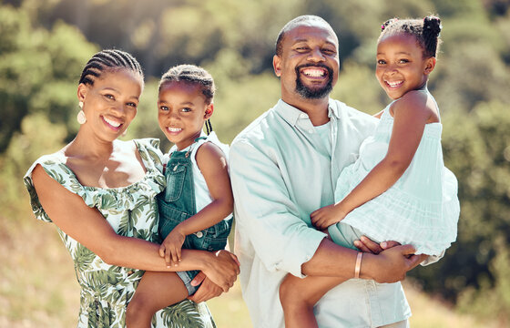 Happy black family, parents and kids in park, garden or backyard to relax, bond and enjoy sunny day together. Portrait of happy mother, smile father and young african children with love, care and joy