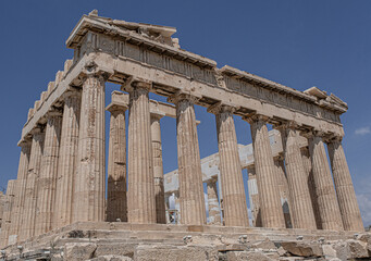 Obraz premium The Parthenon, the former temple on the Acropolis of Athens dedicated to the Goddess of Athena, the long lasting symbol of Ancient Greece, Athens, Greece