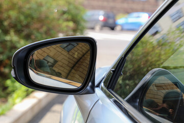 Mirror on the car door. Close-up