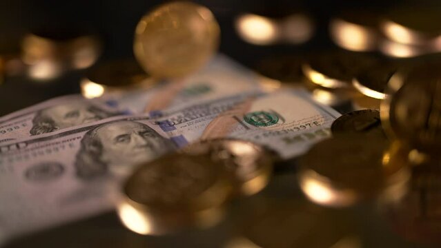 Gold Bitcoin BTC on dollar USD spin in low angle, slow movement shot. Decentralized cryptocurrency. Crypto market price change. Exchange market and digital payment.
