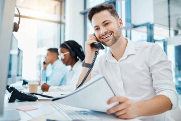Telemarketing, sales or customer service worker smiling and talking on a telephone selling insurance. Young happy call center agent excited by good news on the phone and working in an office - obrazy, fototapety, plakaty