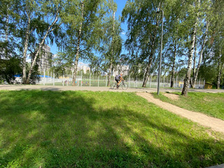 football field near fence at day sunny summer day