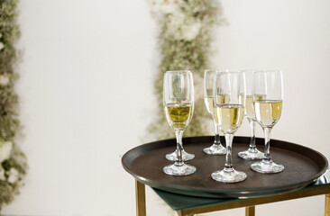 Champagne glasses on a tray