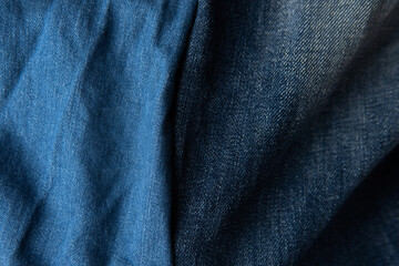 Naklejka premium Comfortable luxury navy natural light and dark blue split two tone with lightweight unisex denim and jeans pants or jackets cloth texture background with space design for fashion