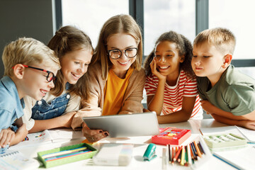 Teacher and students watching video together