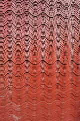 close up of stack red roof tiles for industrial of construction