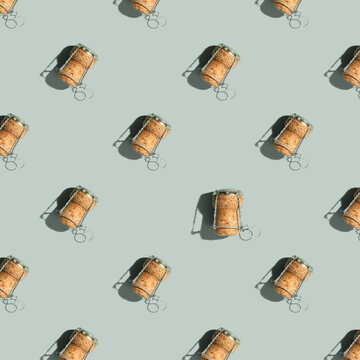 Pattern with champagne cork on blue background with shadow