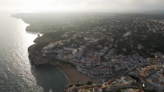 Aerial view of Carvoeiro township, a famous travel destination along the Ocean in the Algarve region, Carvoeiro, Portugal.