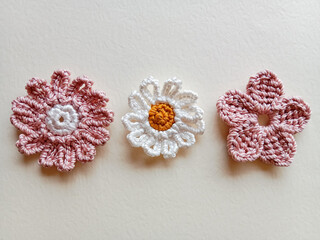 Fototapeta na wymiar Crochet flower. Crocheted flower on white background.