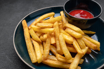 French fries with ketchup on a plate