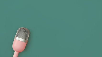 Pink microphone for podcasts on green background. Technology and audio equipment concept