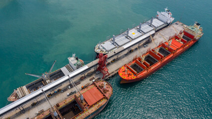 Aerial top view large general cargo ship bulk carrier. - obrazy, fototapety, plakaty