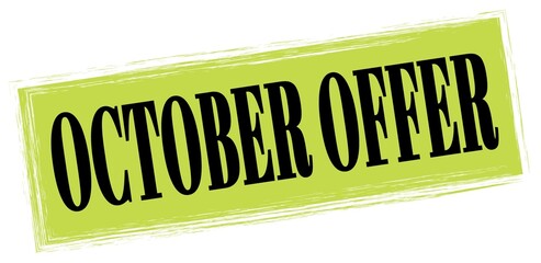 OCTOBER OFFER text written on green-black stamp sign.
