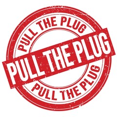 PULL THE PLUG text written on red round stamp sign