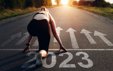 Sporty girl waiting to start the new year 2023.	
New Year 2023 with new ambitions, challenge,...
