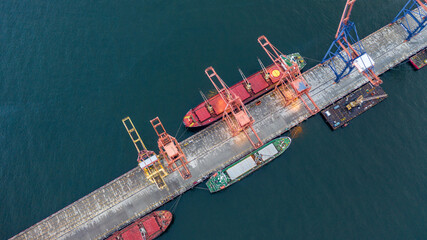 Aerial top view large general cargo ship bulk carrier, Bulk carrier dock, Global business import...