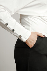 Close up of buttons on women's cotton shirt