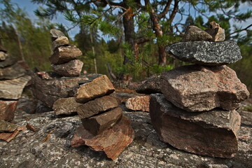 Stone pyramids built by tourists on Mount Kuhovuori
