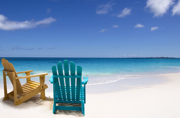 Two chairs on white sand Caribbean beach