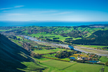 Fototapeta na wymiar Stunning view of the Tukituki river valley and The Craggy Range Vineyard from Te Mata Peak. Beautiful day at Hawkes Bay, New Zealand
