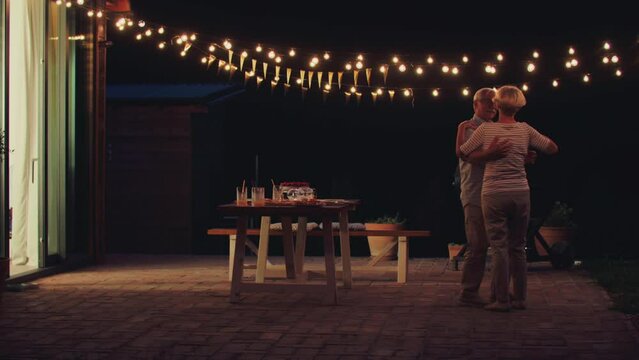 Love never grows old. Senior couple dancing outdoors