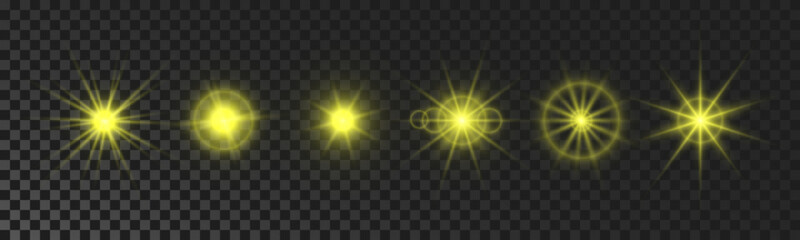 Set of yellow glowing sparkling stars