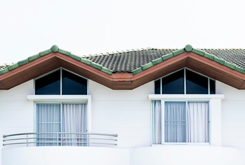 Two windows on modern white house